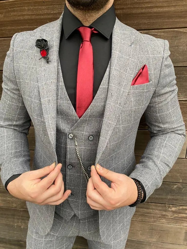 Costume homme gris à carreaux avec cravate rouge